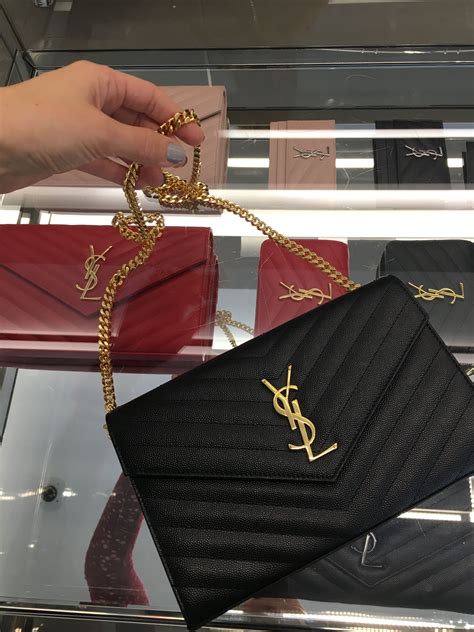 borsa ysl chain wallet mnogram black on black|ysl wallet review.